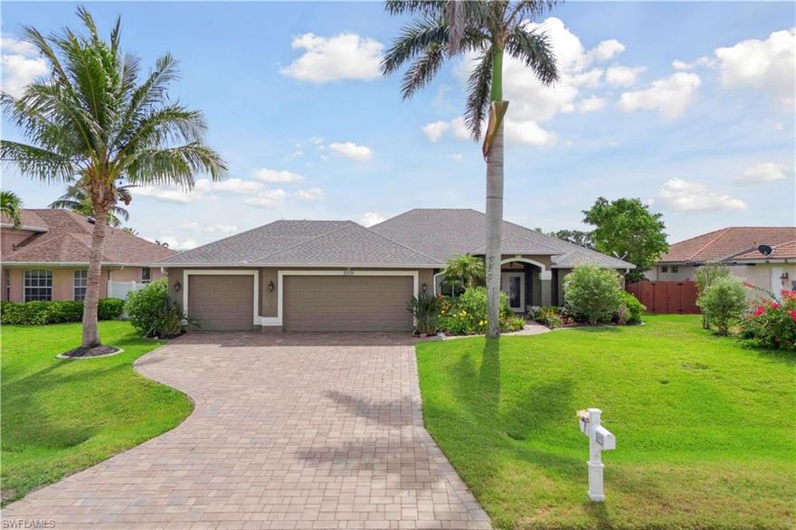 Welcome to a one-of-a-kind Florida retreat where charm meets modern elegance—2209 SW 15th Place in the highly sought-after Southwest Cape Coral area. From the moment you arrive, this better-than-new home impresses with its pavered driveway, lush mature landscaping, multi-tiered decks, and over $110,000 in recent upgrades. This is not just a house—it’s a lifestyle.  LOCATED IN AN X-500 - HAS NEVER FLOODED AND NO FLOOD INSURANCE REQUIRED! Inside, you'll find soaring ceilings and a spacious open-concept layout that seamlessly blends living, dining, and entertaining spaces. The remodeled gourmet kitchen boasts custom cabinetry, premium appliances, and ample prep space—perfect for hosting or day-to-day living. The extra-large secondary bedrooms add flexibility, while the home’s thoughtful floorplan includes three bedrooms, two bathrooms, and a three-car garage. Step outside into a private garden oasis. Enjoy a sparkling pool surrounded by tropical landscaping, a vibrant butterfly garden, and a peaceful viewing deck—perfectly positioned to watch stunning sunrises over the eastern horizon. The park-like setting invites you to relax, reflect, and reconnect with nature right from your backyard.  Truly a special retreat and a perfect place to watch the sun rise!  Located on a freshwater canal with lots of water life and a perfect place to launch your kayak and enjoy the beautiful waterways of Cape Coral. The owner has taken meticulous care of this home, and it shows everywhere! 2024 kitchen remodel, 2023 new dock and fence, new hurricane impact windows, 2021 new roof, 2019 new pool heater, 2025 new hot water heater - this home also features a pre-wire for generator.  This is just a partial list of upgrades. Located close to shopping, dining, and everything Southwest Cape Coral has to offer, this home is the complete package: upgraded, unique, and filled with timeless charm. Don’t miss your opportunity to experience this exceptional property—schedule your private tour today!