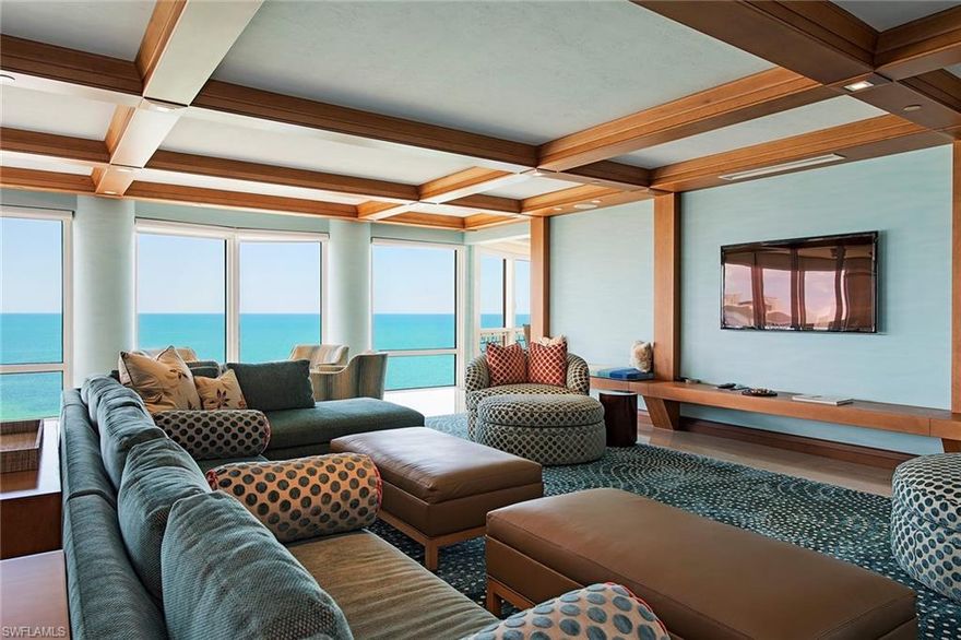 Your seaside wonder awaits you in this stunning beachfront residence in one of Naples' premier high-rise buildings! With one estate per floor and a total of only 28 residences, Enclave offers privacy and uncompromised 360-degree views. Designed with beach-house ambiance, this furnished home encompasses 6,800 square feet of luxurious living featuring a wonderful master suite, three guest suites, a custom library, formal dining area and great room. The gourmet kitchen includes an additional family room area making entertaining a breeze. Building specifications include floor-to-ceiling walls of windows, elevator directly into your private foyer, water detection system and more. Enclave amenities include a private two-car, air-conditioned garage, pool and spa area with grills, fitness and tennis, guest suites, social room and 24-hour security. Park Shore features a lovely beach promenade and the Village on Venetian Bay with upscale shopping and dining. Boat slips are available for purchase or lease across the street in the Venetian Bay Yacht Club.