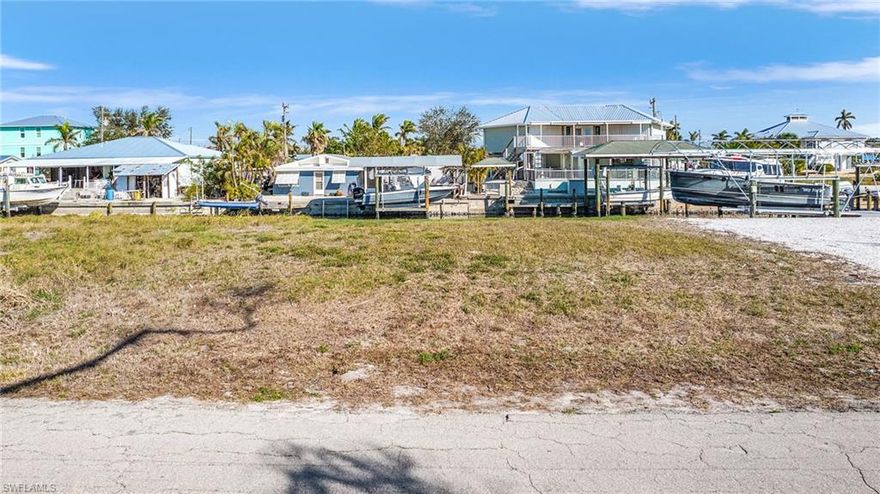 Rare Gem located at 16160 Tortuga St in Bokeelia, FL! This exceptional cleared and filled Gulf access lot, located on the serene north end of Pine Island, is a boater’s paradise. Enjoy a short ride to the captivating Charlotte Harbor, with direct routes to the picturesque outer islands and the stunning Cayo Costa Beach. Imagine building your dream home surrounded by the tranquil beauty of this tropical haven, with endless opportunities for fishing, kayaking, and exploring nearby natural wonders. Don’t miss your chance to embrace the waterfront lifestyle and create lasting memories in this prime location!