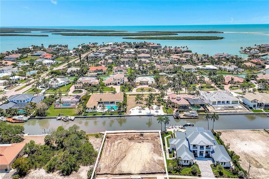 Incredible opportunity to build your custom dream home in a prime location in the prestigious Estates area of Marco Island. On a half-acre southern exposure lot that offers 133 feet of direct access to the Gulf and 10,000 Islands, making this a haven for the boating enthusiast. With higher elevation, and new seawall being installed, this property promises a lifestyle of unparalleled luxury. Embrace the chance to create a home that is yours, in a location that offers tranquility and excitement. Your dream home awaits.