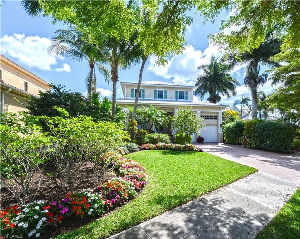 Photo of 725 WEST LAKE DR, NAPLES, FL 34102 (MLS # 225082522)