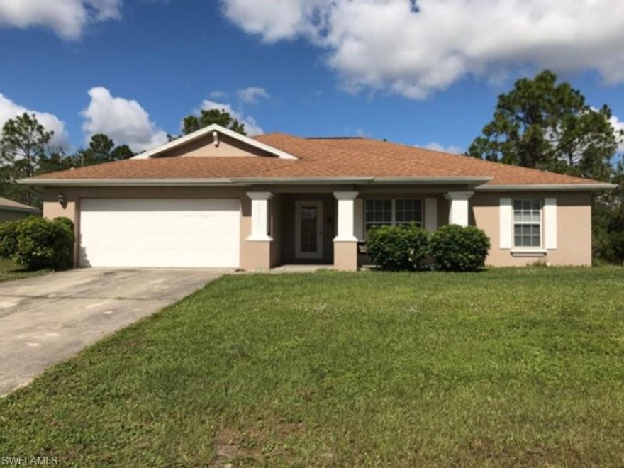 Spacious home located in an area of Lehigh Acres with lots of privacy! This home offers an open floor plan with extra linen closets in the hallway, laundry room, master bath, a den and a large pantry in the kitchen for additional storage. The kitchen is great for entertaining and offers a breakfast bar for meals, large pantry, and an attached laundry room with access to the garage. The split floor plan boasts a large master suite, with a walk-in closet, ceiling fan, attached master bath with a separate shower and tub, and twin sinks. Two large guest bedrooms are located off the living area which is divided by a hallway and guest bathroom. A large den/study area is included in this unit with double doors to access the space. A screened in patio is located off of the living area and the front porch has a custom wood seating area to enjoy the great Florida weather. This property won’t last long!