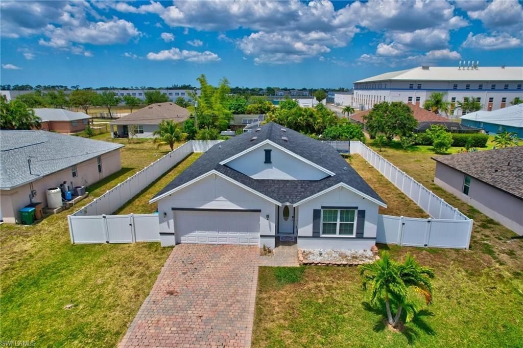 Photo of 1626 SW 6th AVE, CAPE CORAL, FL 33991 (MLS # 225077387)