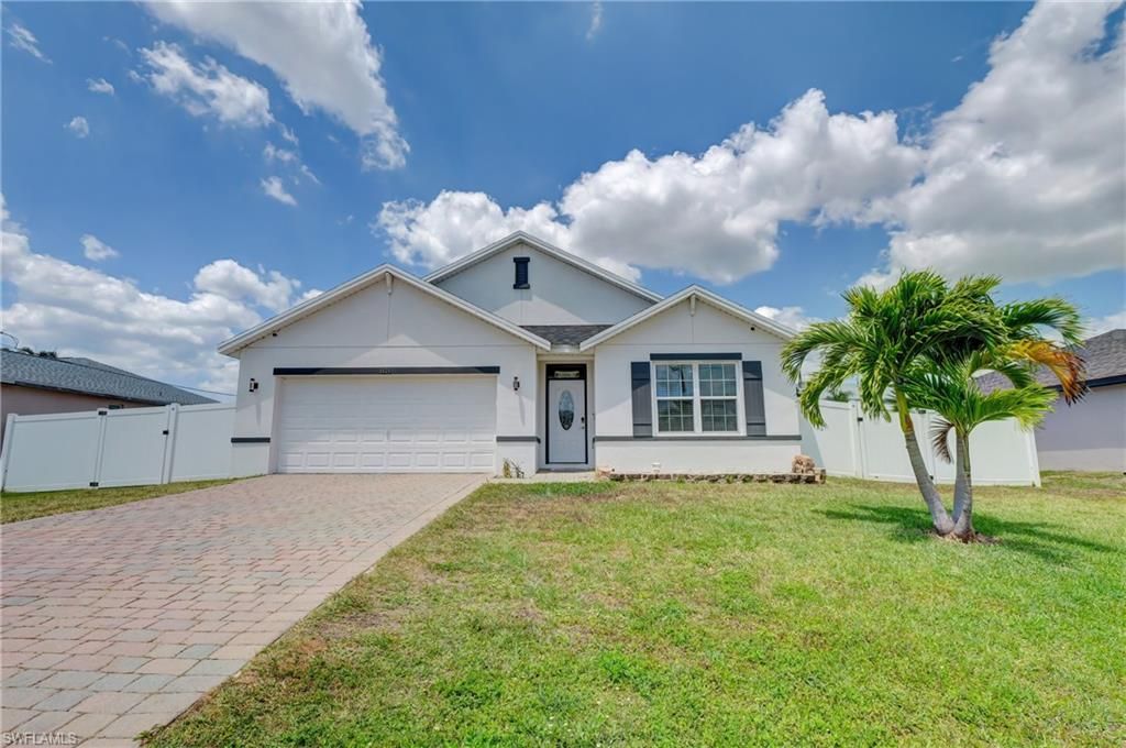 Photo of 1626 SW 6th AVE, CAPE CORAL, FL 33991 (MLS # 225077387)