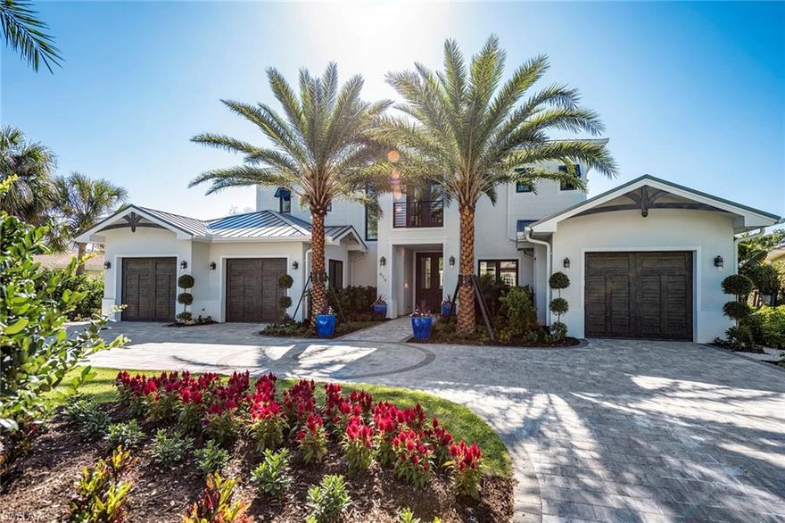 Renowned developer Sea Castle Homes partnered with architect Ashmore Design and designer Carleen Young bring together a distinct home unlike any other. Vintage doors, wood table top salvaged from Edison and Ford Winter Estates and white oak floors and detailing throughout, enhance this curated home just minutes to the beach and Old Naples. Offered furnished, this extraordinary residence features a great room plan that embraces indoor-outdoor flow. The open kitchen with natural elements and mixed metals features two multifunctional islands, and Wolf, Asko and Sub-Zero appliances. Capturing the kitchen’s spirit is a stylish barn door that gives way to a walk-in pantry with designer cabinetry and ice maker. A first-floor master bedroom creates a perfect retreat for quiet space and allows for relaxation with a spa-like bathroom featuring free-standing soaking tub and a hidden laundry. Three additional guest en-suites enjoy privacy and leisure with a second-floor living area and balcony overlooking the pool. On the exterior, multiple covered lanai areas, summer kitchen, fire bowl feature, gas-heated pool and spa with extensive outdoor decking complete this exceptional home.