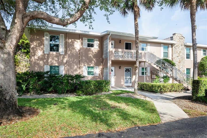 Enjoy absolutely gorgeous views of LaPlaya golf course from this light & bright 2 bedroom, 2 bath end unit.  Recent updates include a new roof, windows and carpeting throughout Living Room, Dining Room and both Bedrooms.  New carports to be installed soon.  St. Andrews Manor offers a community pool with restrooms, mini library and barbeque area.  Low HOA fees.  Awesome location...close to beaches, shopping, dining, medical centers, A-rated schools and I-75.  Being sold "As-Is".