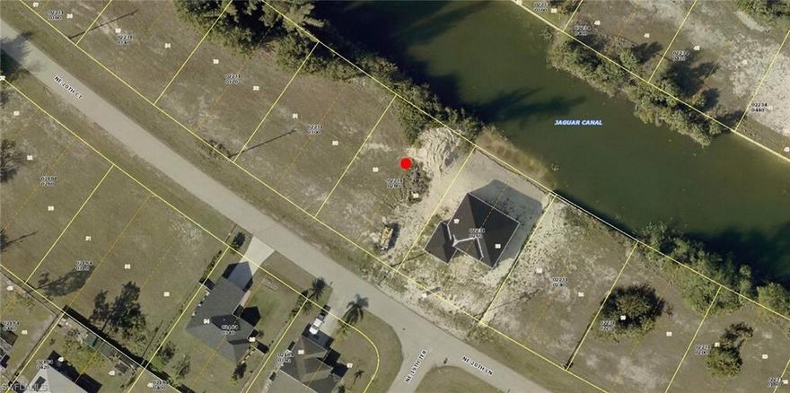 Build your dream home on this beautiful freshwater lot located on the scenic Jaguar Canal in Cape Coral. This prime piece of land offers tranquil water views and the opportunity to enjoy boating, kayaking, or simply relaxing by the water. Nestled off Del Prado Blvd with convenient access to the Pine Island Corridor, this location puts you just minutes from top-rated medical facilities, shopping centers, dining options, and everyday conveniences. Whether you're looking to invest or build your forever home, this property combines location, lifestyle, and value in one of Cape Coral’s most desirable areas. Don't miss the chance to own a slice of Southwest Florida paradise!