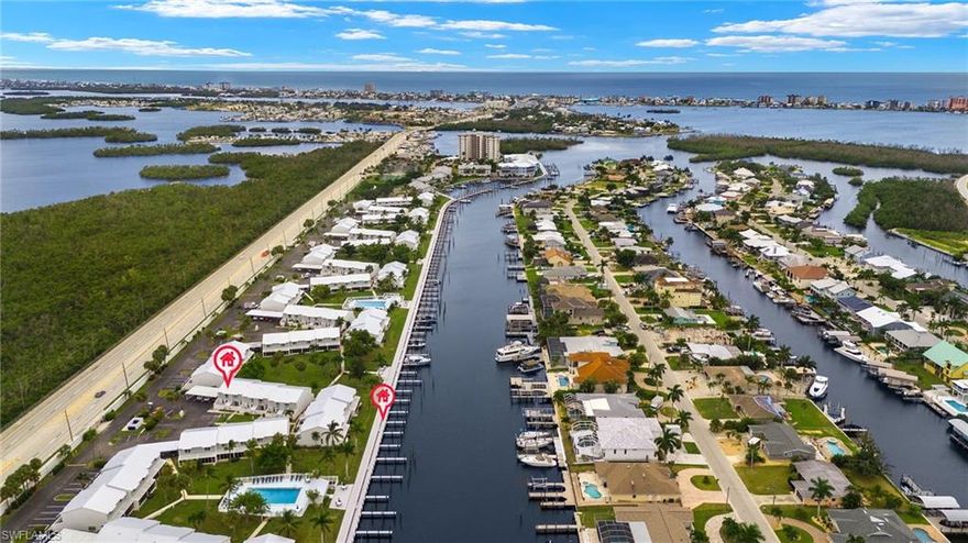 Boat Dock and Covered Parking Space are included. Motivated Seller. Area's Best Deep Canal will take you to open waters of San Carlos Bay, Fort Myers Beach and the Gulf of Mexico in just a few minutes. You can fish off your Dock, or just stroll along the boardwalk canal watching Dolphins play. This newly upgraded 2 bedrooms and 2.5 bathrooms (half bath on the first floor) End Unit is located next to one of the four pools, and "Sunset Watching" sitting area off the half a mile lighted boardwalk. A screened lanai provides the perfect spot to relax and watch the kayakers, paddleboaters or boats passing by. You got it all, including storm rated windows and doors. Boardwalk Caper Community has loads of amenities such as Pickelball, Tennis and Shuffleboard. You are short distance from a variety of restaurants, shopping and a 10 minutes bike ride to Estero Island's Times Square. Start your Florida memories here.