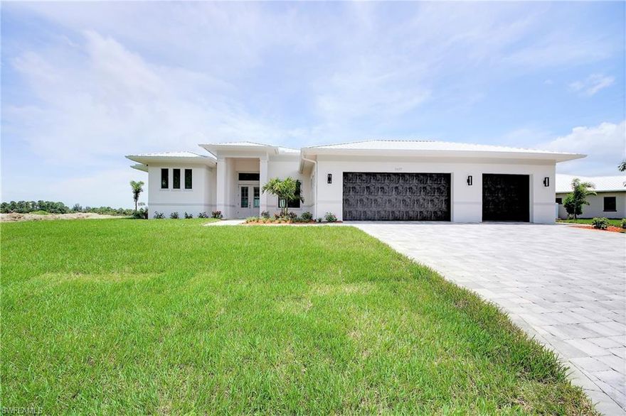 Kismet Lakes - a beautiful gated community of 29 custom half acre properties.  Our most requested model - the Destiny is underway and will be completed by mid fEBRUARY 2021.  This **THREE MASTER SUITES* plus huuuuge office and pool bath plan is centered around a true GREAT room - a gorumet chef's kitchen with 13 foot Calcutta Quartz opens directly into the great room and dining room with MAGNIFICENT views from every room.  Three individual wings in the home allows for privacy and your own individual bathrooms and walk in closets.  The main master suite has sliders, coffered ceilings, a large walk in closet, spa like master bath and so much more.  A double door entry welcomes you and draws your eyes straight outside through the disappearing sliders - the view is incredible. Outside is pure perfection - large pavered outdoor areas with summer kitchens, two picture pool screens, custom pool and spa, coverd lanai with tv outlets, stunning landscaping.  ***Photos are of a previous model and may have some changes***  Still time to pick out your colors.  ALL hurricane impact windows & doors, whole house reverse osmosis **Kismet Lakes is EXEMPT from all future utility expansion **