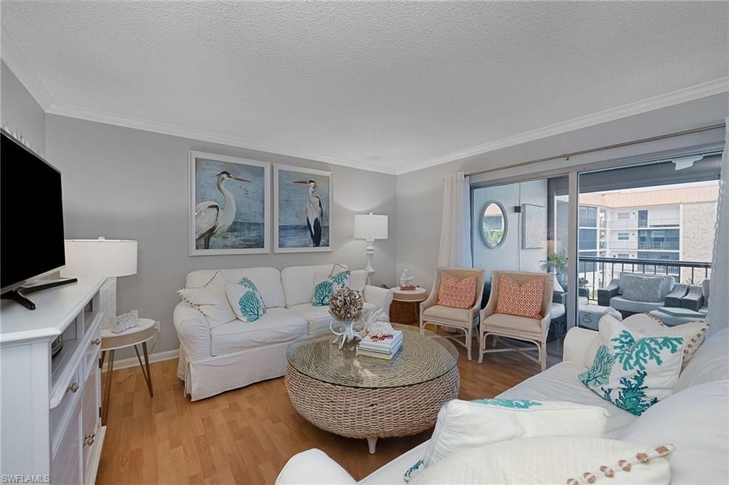 Photo of 2900 Gulf Shore BLVD N #312, NAPLES, FL 34103 (MLS # 225082341)