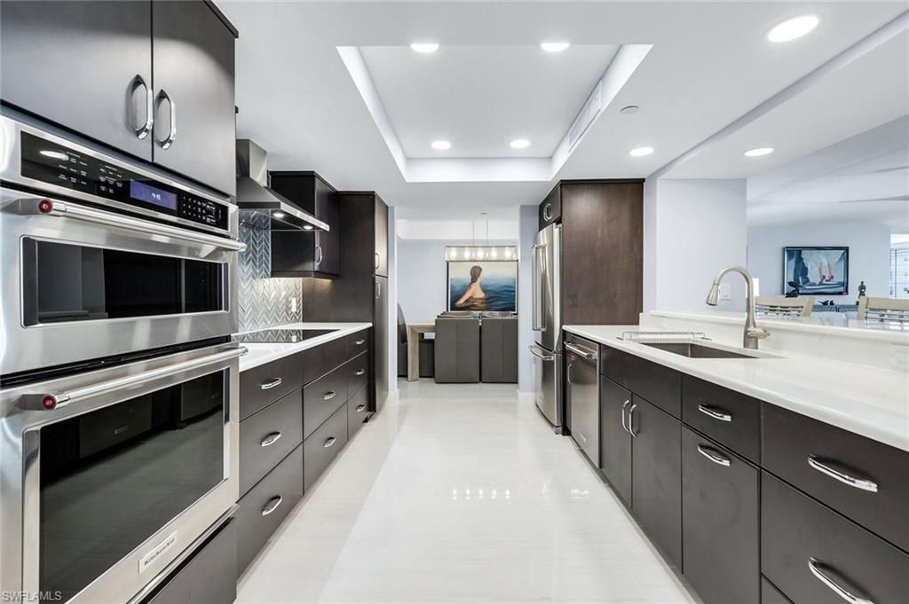 Photo of 5601 TURTLE BAY DR #1802, NAPLES, FL 34108 (MLS # 225081956)