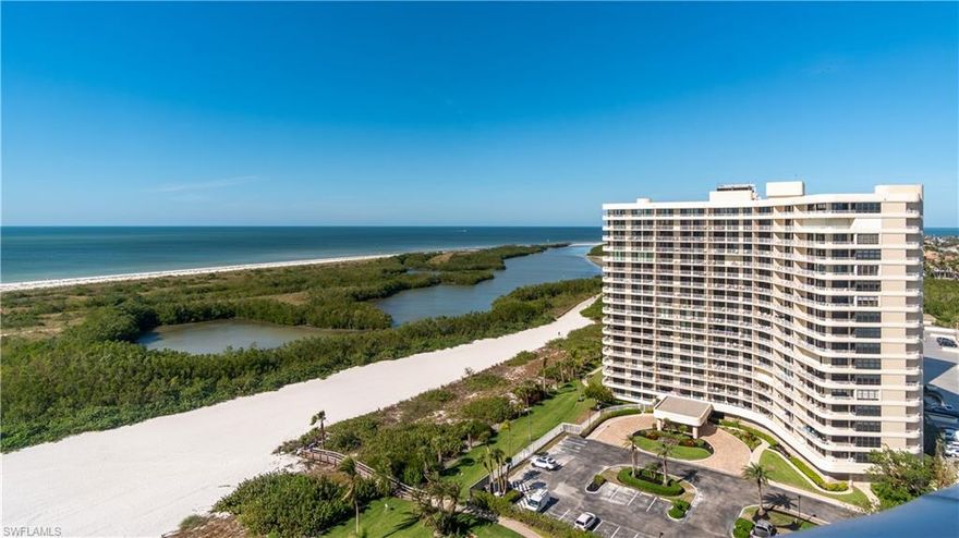 Enjoy stunning views looking south over Marco Island's Crescent Beach, the turquoise waters of the Gulf, and the night lights in the distance. This 2-bedroom, 2-bath unit offers the perfect coastal retreat. Step out onto your private wrap-around balcony and enjoy magnificent sunsets while relaxing in comfort. This gated beach community has it all with poolside beach access to an uncrowded white sand and shell beach and docks for your boat. Along with incredible amenities, including a large heated pool, new fitness center, boat slips, pickleball courts, tennis courts, and Athletic Facility. The common areas were fully updated and remodeled in 2023. Don't miss this opportunity to experience coastal living at its finest.