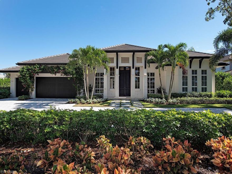 H.14180-Spectacular West Indies styled home designed by Falcon Design and built by Knauf Koenig Group in 2015. This 5-bed, 5 bath home sprawls across almost 5,000 Sq. ft of living space all on one level, with architecture reflecting clean, elegant lines & upscale finish. Floorplan reflects today’s buyer needs with an open concept great room design, big vaulted ceilings and large sliders that let in plenty of natural light.  Features include large mahogany double entry doors, wide-plank white oak floors, intricate ceiling design, superior molding, wet bar, elegant fixtures, oversized laundry, doggie shower, 3-car garage and much more! Entertainer’s dream kitchen with massive marble waterfall-edge island, long prep area w/second sink & bar and top of the line appliances including Wolf gas stove. Spacious master suite boasts 20’ x 12’ walk-in closet w/ beautiful built-ins and ultra-luxurious master bath with his/her water closets, bidet & exquisite shower. The lanai boasts gorgeous custom gas heated pool/spa, summer kitchen, fireplace and electric screens & shutters. Located in the heart of Naples, enjoy the Coquina Sands lifestyle with proximity to the beach, shopping and restaurants