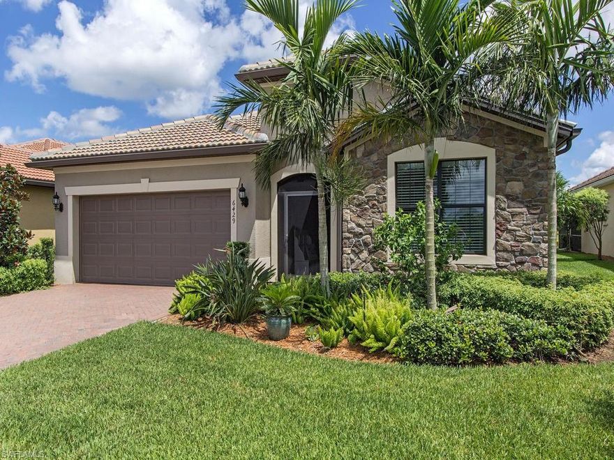 H.13438 - HEAVILY OPTIONED! Abbeyville Classic Series Home on Premium Lakefront Lot, Stunning Views/Relaxing Breezes. 1685 Sq. Ft., 2105 Sq.Ft., 2 Bedroom,Den, 2 Bath, 2 Car Garage. Property Boast MAJOR Structural & Design Options, Too Many to List! Stone Front Elevation, Impact Windows/Doors, 4’Garage Extension, 20x27 Over-sized Covered Extended Lanai w/Upgraded Design Pavers, Front Entry Screen Enclosure, Gourmet Kitchen w/Kitchen Aid SS Appliances & Cook-top, Quarts Counter-tops, Brushed Nickel, Motion Sense Faucet, Under Cab Lighting, Finished Laundry Rm w/Sink, 8’Doors Throughout, Epoxied Garage Floor & Insulated Garage Door, Quality Ceiling Fans, Pendant Lighting, Upgraded in Ceiling Audio, Custom Window Coverings. Property Offered with or without Golf Membership, Contact for Details, Agents See Remarks. Property Complimented by Oasis Club Resort Style Amenity Center – Activities Director, Semi-Public Championship Style Golf Course, and Restaurant. Truly a Must See! “Come Experience the Beauty that is Ave Maria”.