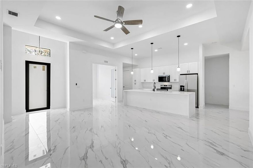 A RARE OPPORTUNITY! BRAND NEW 2026 CONSTRUCTION IN ALVA — NO HOA, NO CDD, NO RESTRICTIONS! This stunning 3-bedroom plus den, 2-bathroom new construction home delivers 1,812 sq ft of thoughtfully designed living space on a generous 0.26-acre lot in the heart of Alva. At $339,990, this is one of the strongest values in new construction in all of Lee County. The home features a bright, open floor plan with soaring tray ceilings and gleaming porcelain tile floors throughout. The gourmet kitchen showcases quartz countertops, stainless steel appliances, soft-close cabinetry, tankless water heater and a large center island. Impact-resistant windows and doors throughout provide storm protection and qualify for maximum insurance wind mitigation credits — estimated annual premium $1,500-$2,500 vs. $3,600+ for older homes. The primary suite offers dual vanities, glass-enclosed shower, and generous closet space. Two additional bedrooms and a versatile den (office, playroom, or guest room) complete the interior. Step onto the covered lanai with extended patio, outdoor sink, and prep station. Bring your boats, RVs, and work trucks — zero HOA fees, zero CDD, zero restrictions. Flood Zone X. Brand new 2026 CBS block construction with full warranty on all systems. Qualifies for USDA 0% down payment financing for eligible buyers. This is the "rural by choice" lifestyle — space, privacy, and freedom. Do not miss this opportunity