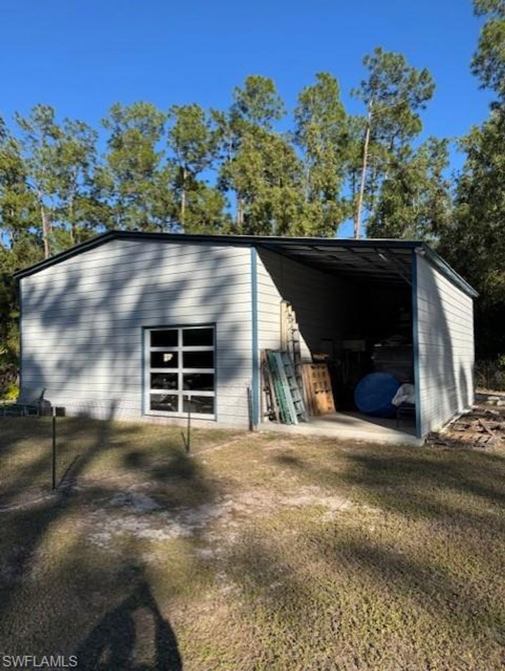 Photo of 4870 Hawthorn Woods WAY, NAPLES, FL 34116 (MLS # 226015413)