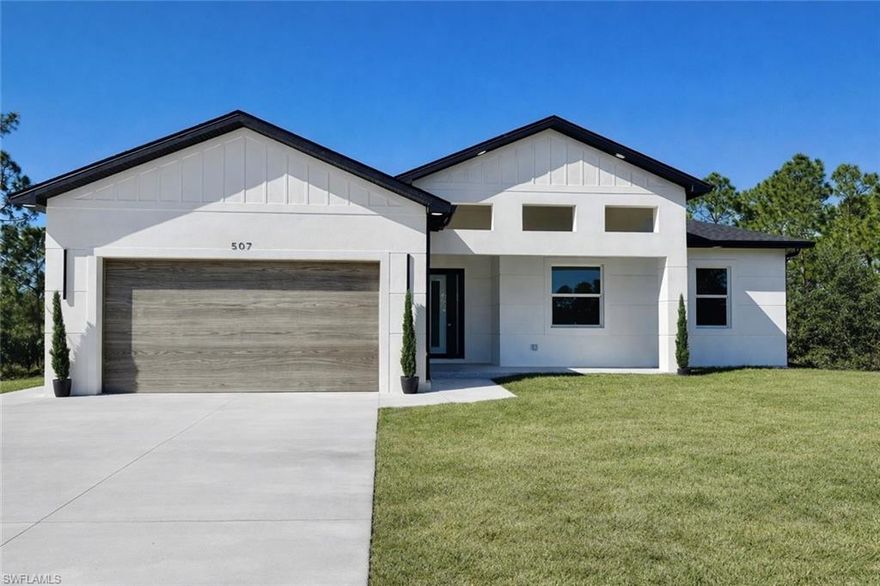 Brand New Home located on a quiet low traffic street on A HALF ACRE LOT, larger estate sized homes in the area, MOVE IN READY 4 BEDROOM 3 FULL BATHROOMS with TWO MASTER SUITES, EXCELLENT FOR IN LAW QUARTERS, C.O. HAS BEEN ISSUED, 24 X 48 POLISHED PORCELAIN TILE FLOORS THROUGHOUT THE ENTIRE HOME with 5 inch baseboards, impact resistant windows and doors, OUTDOOR KITCHEN ON LANAI OVERLOOKING THE BACKYARD, decorative wood color on garage door, extra concrete side drive off of the driveway for additional parking or turn around, covered front porch with seal coated floors leads to large great room with grand entry, coffered ceiling with decorative wood accent wall, high entry foyer with lighted decorative shelf, high volume ceilings throughout with tray ceilings in the living room and master bedroom, shaker cabinets with soft close doors and drawers, decorative lighting over breakfast bar, QUARTZ WATERFALLL COUNTERS WITH QUARTZ BACKSPLASH, stainless steel appliance package, large dining area with upgraded light fixture, spacious master bedroom with dual walk in closets, private bath with dual sinks with upgraded light fixtures including LED lighting built into the mirror, tiled walk in shower with frameless glass doors, 4th bedroom guest quarters off of the kitchen area with it's own private bathroom, indoor laundry room with built in cabinets, double garage with grey seal coated floors, excellent location just minutes to I-75, Ft Myers and SWFL International airport.