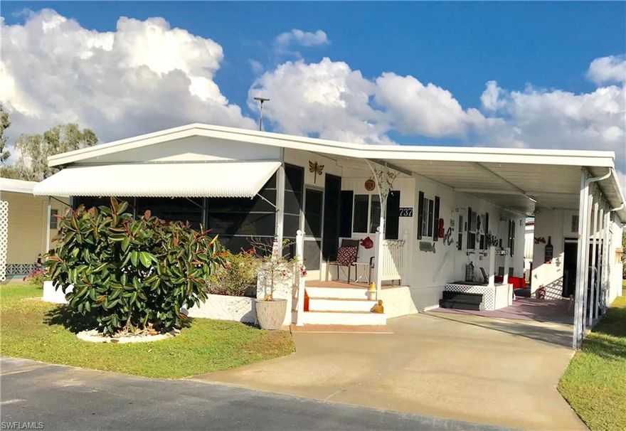 SPACIOUS, GORGEOUSLY UPDATED doublewide~IMMACULATE & Ready for You! Don't miss this Beautifully remodeled home PRICED to SELL! Furnished TURNKEY! Own this unit AND your LAND while you Enjoy MAINTENANCE-FREE AFFORDABLE LIVING in the Sunshine State! Meticulously-maintained & ideally located near the heated community pool on a quiet street w/no through traffic. You'll LOVE the sunny front Florida room with lovely water view. Gorgeous wood laminate floors. LARGE bedrooms & 2 updated baths. NEW windows throughout. Enjoy the open living room & bright & airy UPDATED kitchen featuring raised-panel wood cabinets, breakfast bar & glass-top stove. 1152+sf under A/C PLUS laundry (newer Washer/Dryer included)~GOLF CART GARAGE w/extra fridge & ample storage. Fireplace, flat/screen TVs, new mattresses included (see short list of exclusions). Awnings all around for shade & weather protection. LOW monthly fee $135 includes recreation facilities, common grounds maintenance & trash pick-up. Walk to the pool & enjoy a friendly 55+ Community w/2 clubhouses, shuffleboard, ponds, parks, mature landscaping, street lights. Low-cost RV & boat storage available on-site! Golf cart available separate purchase.