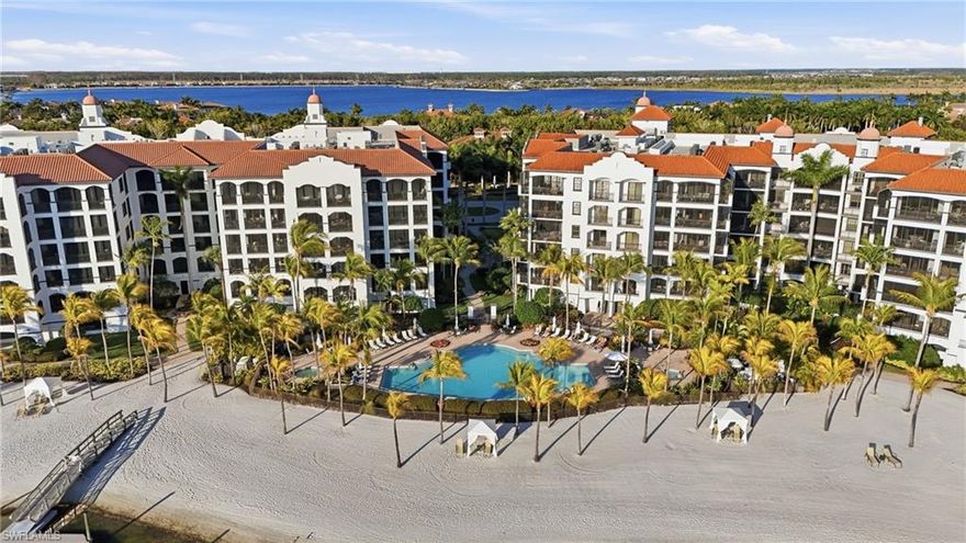 Experience refined beachfront living from the fifth floor of this luxurious residence in the prestigious Mirasol enclave of Miromar Lakes Beach & Golf Club — the nation’s top-ranked gated community.
Spanning 2,386 square feet, this beautifully appointed condominium offers 3 bedrooms plus a den and 3.5 baths, designed with a highly desirable great room and split-bedroom floor plan that maximizes privacy and livability. Floor-to-ceiling views showcase the breathtaking beauty of Lake Como, creating a stunning backdrop from the main living areas.
The gourmet kitchen has been tastefully updated with quartz countertops, upgraded appliances, and an elegant breakfast bar, making it ideal for both everyday living and entertaining. The expansive primary suite is a true retreat, featuring private lanai access and a spa-inspired bath with dual vanities, a soaking tub, and a separate glass-enclosed shower.
Two guest bedrooms offer en-suite baths, ensuring comfort and privacy for visitors. Tile flooring runs throughout the main living areas, while rich wood floors enhance the den and all bedrooms.
Perfectly positioned within walking distance to the award-winning Beach Club, residents enjoy world-class amenities including boating, championship golf, tennis, fitness, dining, and the signature white-sand beach lifestyle that defines Miromar Lakes.