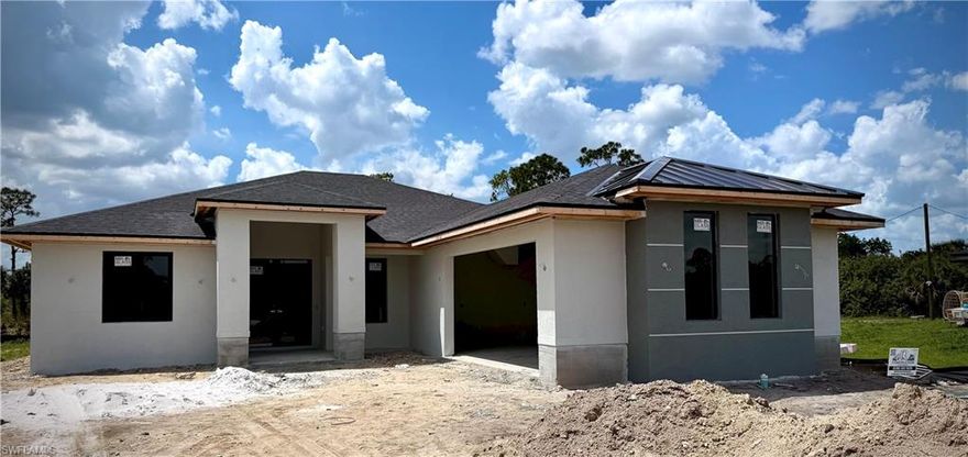 Explore your future home in this stunning property for sale under construction, crafted to provide both comfort and style. This residence includes three roomy bedrooms and two bathrooms, along with a cozy den that can be tailored to your needs. The kitchen is exceptional, featuring a central island that will be equipped with a cooktop, a stylish telescopic downdraft system, and a handy pot filler. A modern suspended ceiling above the island enhances its elegance. The practical laundry room provides direct access to the bathroom and the master bedroom, streamlining daily chores. The kitchen also offers a spacious walk-in pantry, perfect for all your storage needs. The expansive lot is ideal for those envisioning a pool in their backyard, complete with an installed shower for added convenience. Come see this property, where every detail is thoughtfully designed for a warm and functional environment for your family. Don't miss this opportunity! Expected completion date June/2026