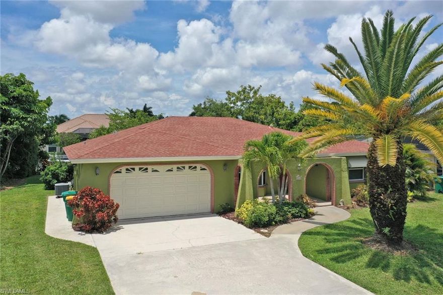 3 bedroom, 2.5 bathroom home with den will give you 1810 sq ft of generous space. This home could easily be converted into a 4 bedroom. Irrigation is on well. Located in the center of town, close to downtown shopping, dining and beaches! Located in Coconut River Estates, direct gulf access with a voluntary low HOA! Community boat ramp, heated pool, tennis courts, shuffleboard courts, dog park and brand new pavilion available for free rental all available for a low, voluntary $450 yearly fee.