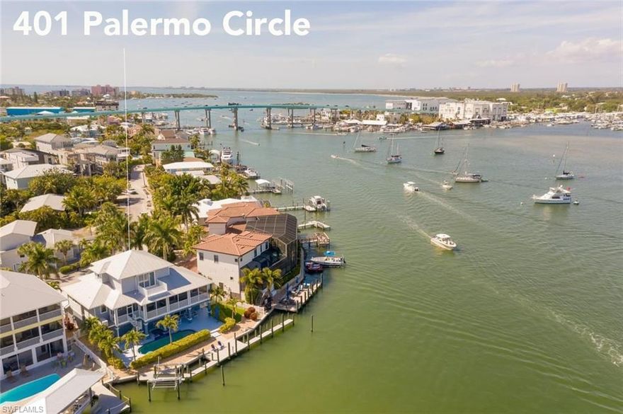 Amazing Bay Front home or make it an Investment property located in rare Weekly Rental zone on the North End! This 5,030 total sq ft estate has panoramic Bay views. Direct Gulf Access home offers an unparalleled combination of quality, finish and opulence. 3 Bed/4 Bath +Den/Off or 4th Bedroom , Open Floor plan, Large Lanai, Gourmet Kitchen, top of the line appliances, solid Granite countertops, Italian White Carrara Marble flooring, Elevator, Bose Surround , 2 fireplaces, wet bar/ice-maker, intercom and alarm. All Hurricane Impact windows, sliders and doors, a 25kw whole house generator. Elevator leads to all 3 floor levels, offers convenience for all. The top floor Master Suite has private balcony, His & Her bath rooms, Jacuzzi tub, shower, large walk in closet. Short walking distance to the beach, Boater's dream,only 10 min. to the Gulf of Mexico! A 3 Car Garage for all your toys. Watch the Dolphins play from your large Pool with Spa. 93ft+-Dock has 55ft slip (See 55ft Viking pic) + a 7K lb Boat/Jet ski lift on one of the best streets on the island. Minor hurricane damage in garage, all fixed. No Structural damage per Report. Some Photos are pre-Hurricane.