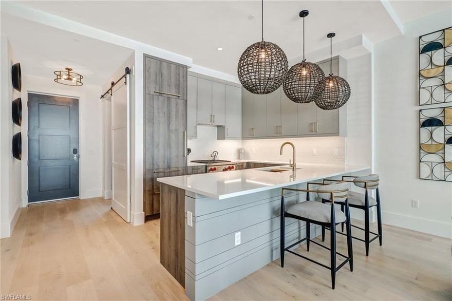 This beautifully appointed 2 Bedroom + Den, 2 Full Bath residence at Eight Fifty Central a low-density 22 unit building, ideally located West of 41 and newly constructed in 2021, captures the essence of effortless Naples living and is offered TURNKEY, ready for immediate. 

Designed with a modern and clean aesthetic, the open-concept floor plan is anchored by wide-plank DeChateau wood flooring and enhanced by a kitchen featuring natural GAS cooking and premium WOLF and SUB-ZERO appliances. The seamless flow between kitchen, dining, and living spaces creates an inviting environment ideal for entertaining or unwinding. Electric privacy shades on the sliders and plantation shutters throughout add both refinement and convenience. The thoughtfully designed layout includes two spacious bedrooms, two full baths, and a versatile den that easily functions as a home office or additional guest space. Furnished with timeless selections from Arhaus and Pottery Barn, the interiors strike the ideal balance between warmth and sophistication.

Residents of Eight Fifty Central enjoy a lock-and-leave lifestyle just blocks from Fifth Avenue South, Third Street South, and Naples’ world-renowned white sand beaches. Walk to award-winning dining, vibrant cafés, art galleries, shopping, and year-round events, all while returning home to a private, amenity-rich retreat. The community offers a resort-style pool, outdoor grilling area, secured lobby entry and covered parking.

This residence offers not only exceptional personal enjoyment but also strong income potential. Whether seeking a seasonal escape, full-time residence, or investment opportunity, this property delivers location, luxury, and lifestyle in one of Naples’ most coveted settings