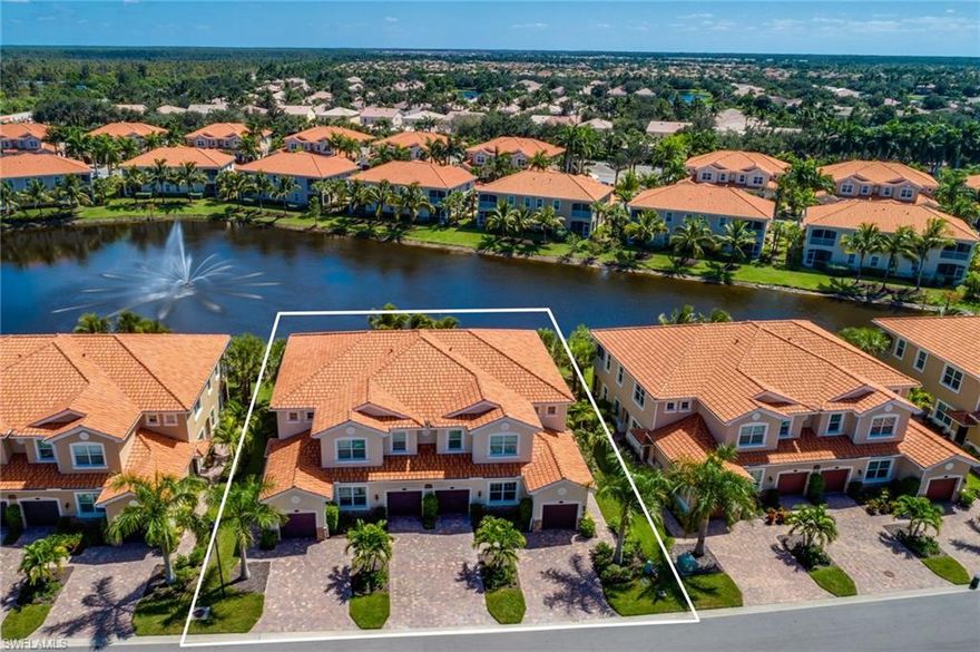 This is it! A FIRST FLOOR END UNIT with an expansive waterfront lot. This seldom occupied 2nd home is in pristine condition and has been meticulously maintained. Situated with great views of the lit fountain. This condo is offered TURNKEY FURNISHED with quality furnishings. Hurricane impact glass windows and doors contribute to this maintenance free lifestyle. Completely tiled with no carpet. The stainless steel kitchen offers 42 inch wood cabinets with under-mount lighting and granite counters that are matched in both baths. The master bathroom offers his and her sinks that were not available in the early stages of the communities development. Crown Molding, 5 1/4 inch baseboards, and diagonal patterned tile are just some of the upgrades that make this home like no other. This gated community offers a resort style pool and is located minutes to everything! Just 10 miles to what has been regarded as one of the nicest beaches in the United States. Schedule your showing before its too late!