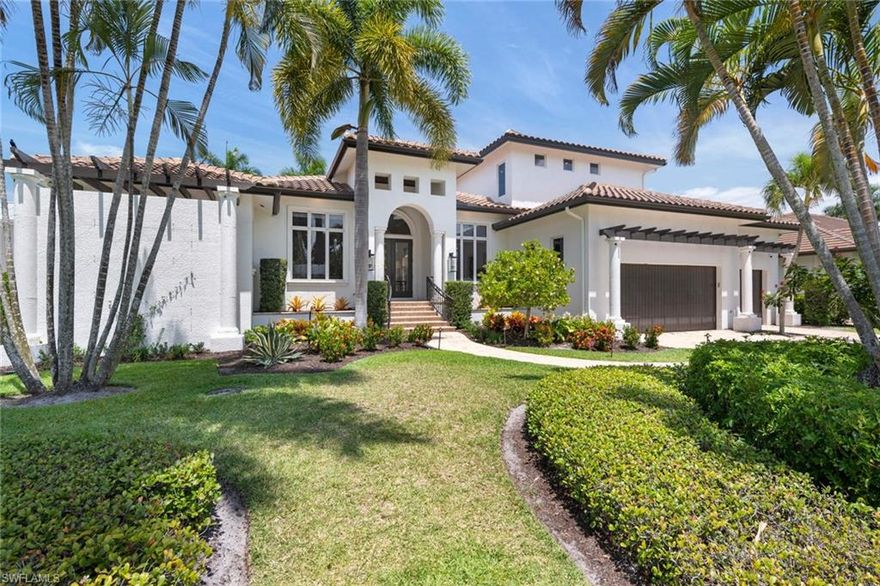 Welcome to the Moorings, a prestigious residential neighborhood located in the heart of Naples. This home qualifies for membership to the Moorings private beach access for $200/year. This location is close to world class shopping, dining, and entertainment. As you enter this gorgeous open floor plan home drenched with natural light, you will notice the warm wood floors and exquisite attention to detail in the beautiful finishes. Stunning gourmet kitchen with high end appliances, luxurious baths, outdoor summer kitchen complete with gas grill to entertain while everyone enjoys the warm pool waters. This home was remodeled in the past year and includes new A/C, pool equipment, alarm, AV/sound system, and is just breathtaking.