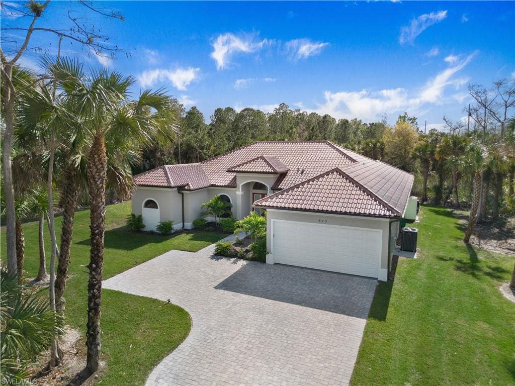 Photo of 610 25th AVE NW, NAPLES, FL 34120 (MLS # 226019190)