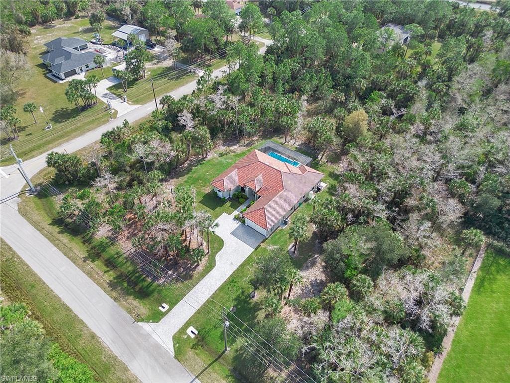 Photo of 610 25th AVE NW, NAPLES, FL 34120 (MLS # 226019190)