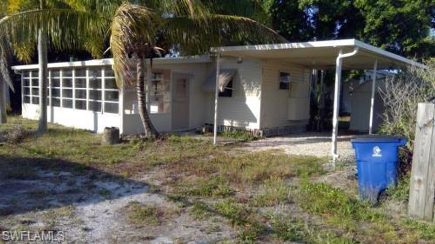 Looking for Island living? This older 2/1 is waiting for a new owner. Although small it offers cozy living for a single person or couple. Featuring newer flooring throughout (2024), new a/c wall unit with heat (2025), upgraded electric (2025) and a huge, screened lanai for your outdoor pleasure. Lot is nice sized with 2 sheds for extra storage. Remodel or knock done & rebuild for a slice of Island life with community gulf access. All information deemed reliable but not guaranteed, buyers to do due diligence.