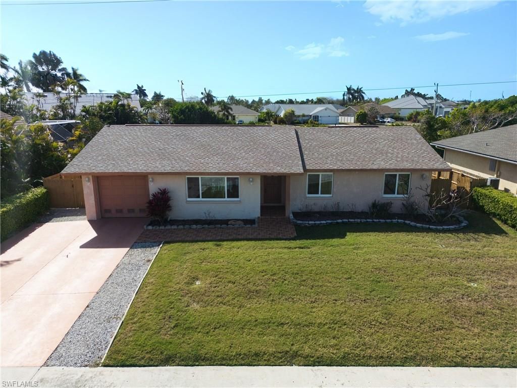 Photo of 188 Gulfstream ST, MARCO ISLAND, FL 34145 (MLS # 226010410)