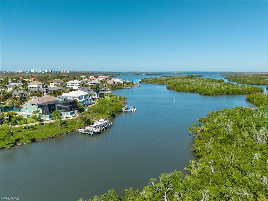 ULTIMATE BOATER’S RETREAT ON EXCLUSIVE CONNIE MACK ISLAND — Experience the pinnacle of Southwest Florida coastal living from this exceptional waterfront residence, perfectly positioned within the gated Jonathan Harbour community. The home offers premier water access, quick passage to the Gulf and Bay waters, and a level of privacy rarely found, all complemented by breathtaking sunrise skies and tranquil nature preserve views. Designed for both durability and luxury, this 4/5 bedroom + den estate is built with solid concrete construction inside and out and features extra high elevation for peace of mind. Inside, the home offers spacious, light-filled living areas on both interior floors, Thermador appliances, 2 laundry areas, a private elevator for effortless multi-level access, a beautiful custom concrete interior staircase and a layout ideal for both everyday living and entertaining. Outdoor living is where this property truly shines. Enjoy an elevated pool and spa deck, roof top sundeck/observation area, expansive balconies, a full exterior concrete stairway from top to bottom landing off each amenity area and a fully equipped outdoor kitchen featuring all enhanced by upgraded granite finishes. A dedicated pool bath adds convenience, while remote-controlled hurricane shutters, Impact windows and doors and a whole-home generator with 1000 gallon propane tank provide comfort and security year-round. For boating enthusiasts, the property delivers an unmatched setup with a two-slip dock, lifts, fish cleaning station, and an oversized multi car garage with a dedicated “tackle room” for seamless water access. Whether heading out for a day of world-class fishing or a sunset cruise, you’ll appreciate the immediate access to open water. Recent upgrades since 2023 include a new roof, all new A/C, tankless gas water heaters, fresh interior and exterior paint, a new pool pump, and a rescreened lanai with no-see-um protection and oversized picture window panels. Ideally located just minutes from the white-sand beaches of Sanibel and Fort Myers Beach, as well as scenic biking trails and nature preserves, this home offers the perfect balance of seclusion and accessibility. A rare opportunity to own a true waterfront sanctuary where luxury, resilience, and the ultimate boating lifestyle come together. This is one of the best waterfront opportunities in all of Southwest Florida!