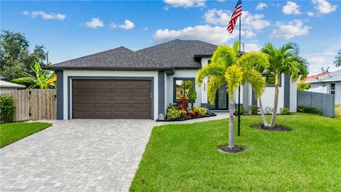 Photo of 712 NW Juanita PL, CAPE CORAL, FL 33993 (MLS # 225035238)