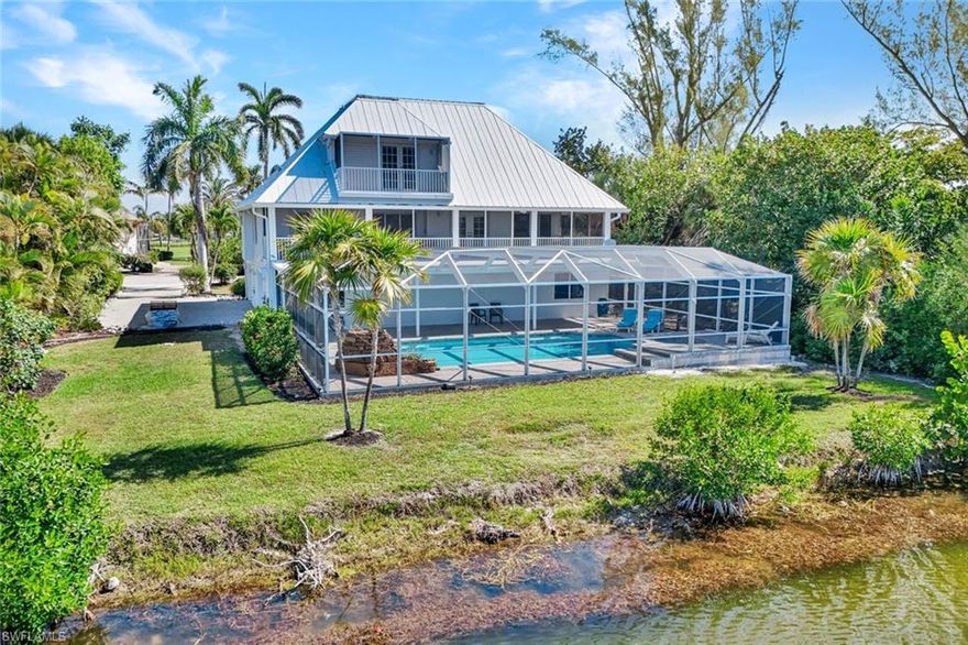 Nestled along the tranquil shores of Horseshoe Lake, this exceptional Florida-style residence offers expansive water views, upscale finishes, and the perfect blend of comfort and functionality across three spacious levels. Designed for both everyday living and entertaining, the home features soaring ceilings and an extended chef’s kitchen with granite countertops, custom maple cabinetry, stainless steel appliances, built-in oven and microwave, sleek glass cooktop, and a convenient computer nook. Just off the kitchen, a tiled veranda provides the perfect setting to enjoy peaceful lakefront vistas.

The luxurious primary suite is a true retreat, featuring dual walk-in closets and a private screened balcony overlooking the water. The spa-inspired primary bath offers a soaking tub, oversized tiled double shower, and separate lavatory and bidet rooms for added privacy and convenience. Guest accommodations are equally inviting, with custom built-ins and direct walk-out access to the lanai.

Recent improvements add tremendous value and peace of mind, including a beautifully refurbished pool and spa, a brand-new A/C system with updated ductwork, and a private elevator servicing all three floors with ease. Additional highlights include plantation shutters, electric storm shutters, security lighting, and abundant lower-level space ideal for storage, hobbies, or flex use, along with a spacious two-car garage. Best of all, the home’s living areas have remained free from damage during previous storms, offering added confidence in this well-maintained waterfront property.

Located within Sanibel’s highly desirable The Dunes Golf & Tennis Club community, this home also offers access to one of the island’s premier lifestyle destinations. Membership is not mandatory, but may be purchased to enjoy the Audubon-sanctioned 18-hole championship golf course, six Har-Tru tennis courts, and dedicated pickleball facilities—creating an exceptional opportunity for those seeking an active and amenity-rich island lifestyle.