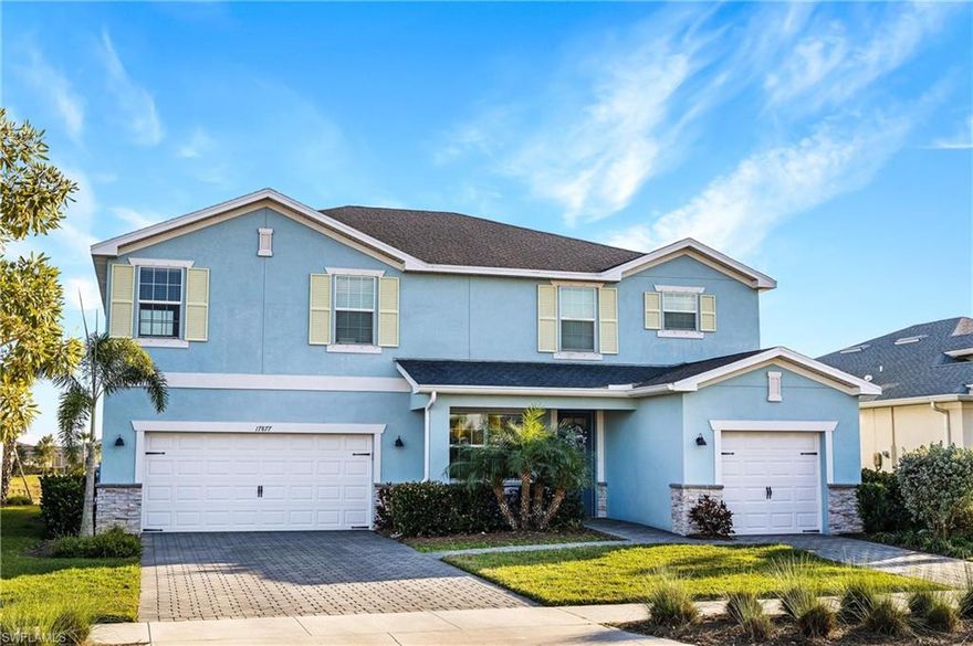 This Majestica model is a bold and beautiful configuration of 3,283 square feet of living space. There are five spacious bedrooms, enough for everyone to claim their own private retreat! There are four and a half baths to provide plenty of privacy and pampering time. The open-concept kitchen and great room make a perfect gathering spot night and day, complete with breakfast nook and access to the covered extended lanai and pool. For more formal occasions, the connected living and dining room offer the perfect spot for entertaining. The 5th bedroom on first floor is an ideal spot for house guests or a home office. The second floor bonus room beckons for a library or media room. Split 3-car garage delivers plenty of options for both cars and toys. This home features plank tile, white shaker cabinets, granite countertops, shiplap with chair rail, crown molding, floor outlets, tankless water heater, with a lakeview.