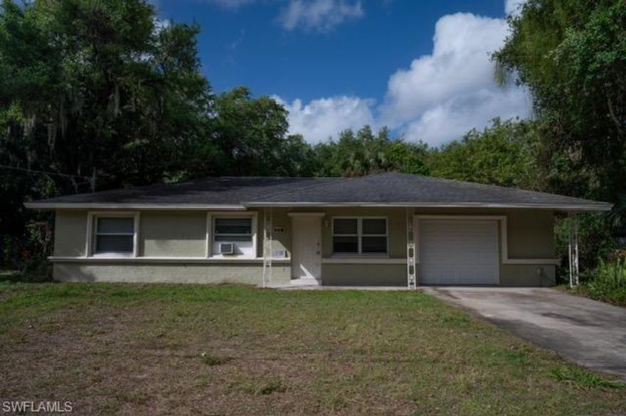 Great  buy near downtown  Fort Myers. Needs some tlc. Level lot, close to river. 2/2 with garage .One block from the river.  You can see the river from driveway.