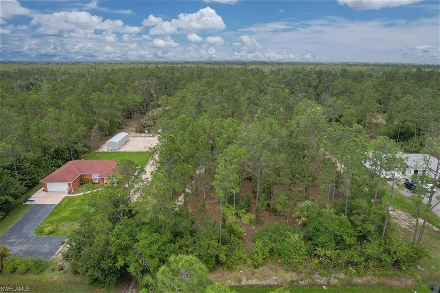 *Seller has received multiple offers. The Highest and Best time has now lapsed"

Unveiling an exceptional opportunity to realize your dream home in one of Naples' most coveted locales. Nestled within the prestigious Golden Gate Estates, NE 47th Ave offers 1.14 acres of unparalleled potential, boasting 1.1 acres of uplands—a rare find in this sought-after area.

Key Features:

Spacious Acreage: With a vast 1.14 acres at your disposal, envision crafting your bespoke estate amidst the tranquil backdrop of native trees, lush palms, and verdant foliage. This expansive canvas ensures ample space for architectural innovation and landscaping creativity.

Superior Privacy: Embrace the serenity of a secluded sanctuary, positioned on a quiet dead-end street with minimal traffic flow. Enjoy the luxury of unobstructed views and natural seclusion, fostering an ambiance of peaceful retreat within your own private oasis.

Ideal Location: Situated within Golden Gate Estates, renowned for its upscale residences and picturesque surroundings, this property offers proximity to top-rated schools, premier shopping, dining destinations, and pristine Gulf Coast beaches—providing the perfect balance of convenience and exclusivity.

Additional Information:

Explore the attached DEP Report for comprehensive insights into the environmental characteristics and development potential of this remarkable parcel.

Don't miss this unparalleled opportunity to embark on a journey towards the epitome of luxury living. Seize the moment to secure your slice of paradise and commence the realization of your ultimate vision.

Contact us today to schedule a private viewing and unlock the limitless possibilities awaiting you at NE 47th Ave.