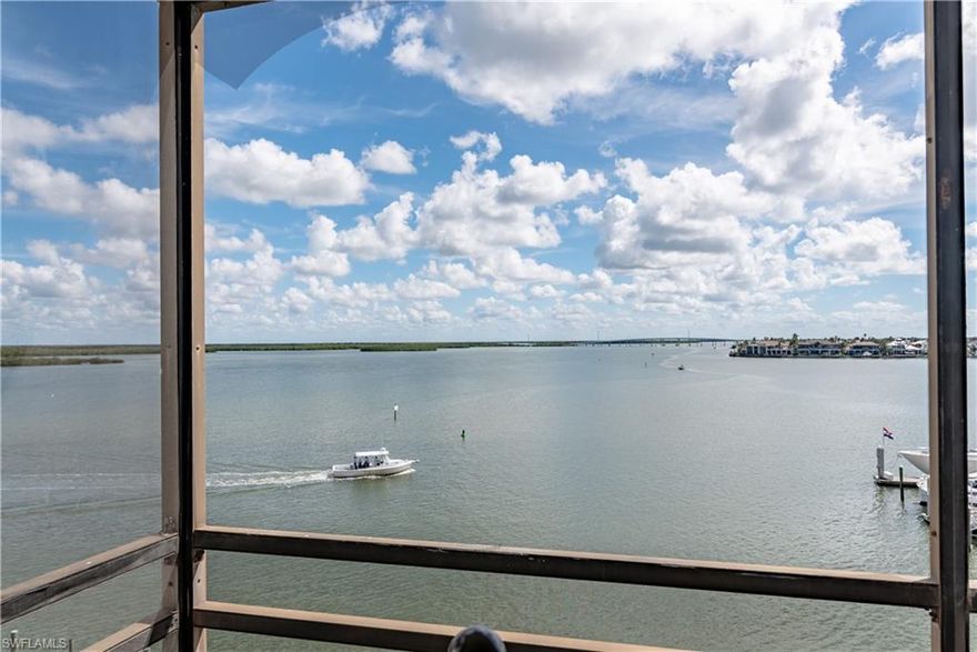 Gorgeous views from this updated 1 bedroom, 1 bath, top floor condo in highly desired A building. Sit on your lanai that captures big views of the Marco River leading into the Gulf of America in just minutes and watch the boats go by. Amenities are endless; on site Marina with boat slips available for lease only $600 per year. Tennis / pickleball courts, 2 pools and hot tubs, fishing pier,new community clubhouse at marina that is on site, and close proximity to restaurants and shopping. This updated coastal condo is the perfect getaway or investment with electric included in monthly fees. This complex also allows nightly, weekly ,and monthly rentals. New updated lanai railings and screens, A/C updated in 2017, hot Water Heater updated in 2021, gorgeous quartz countertops, sinks and faucets updated in 2021. All lighting and switch plate and outlet covers updated in 2021. All windows replaced in 2022 that are hurricane impact for maximum protection. Newer SS Appliances, and stove in 2021. New glass/screen door at the entrance added in 2021 along with Washer/Dryer hook-up in condo. This turnkey unit in this gated community is a prime location for you're next home