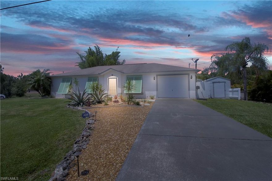 Move in ready 3 bed/2 bath home in a quiet area of Punta Gorda. This home has an open concept and is situated on 3 lots. The back yard has a screened in lanai, a concrete patio for your grilling needs and a brick paver patio that is great for your morning coffee or your evening drink and watch the amazing sunsets.  The yard offers low maintenance plants and has a large fenced in area for your furry babies.  This beautifully home has tile throughout with laminate flooring in the laundry room. Windows have Bahama shutters with easy close & are hurricane certified. The Lanai also has storm shutters. Ceiling fans offer plenty of comfort in the living/kitchen area. The HVAC system, water aerator and water softener have been covered to lesson the affects of the sun. The kitchen has newer counter tops, dishwasher, faucets, large custom made pantry, a pull out spice rack, water purifier and a pull out shelf for smaller appliances. Refrigerator was replaced in December 2020.  The home features an inside laundry room and a tankless water-heater. The 12’ X 20’ shed that has electricity and an RV pad on the side with additional space.