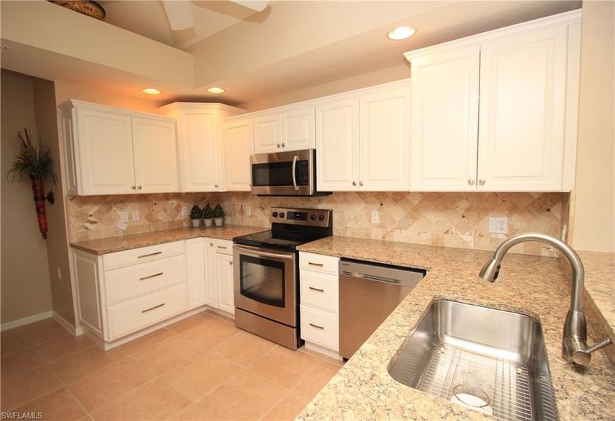 BEAUTIFUL Upper level coach home, with too many updates to list...MUST SEE! Unit is a short walk to the Clubhouse! Desirable No Naples bundled golf community of CYPRESS WOODS GOLF & COUNTRY CLUB features an 18-hole championship course designed by Gordon Lewis with a putting green and aqua range. Cypress Woods is located near many of the area's attractions & conveniences, including county & state beaches and preserves, the Mercato, shopping & restaurants, places of worship, schools, medical care, I-75, and RSW Airport. This unit has a 2 car garage & features a great room with 3 split bedrooms, 2 bathrooms and a screened lanai with golf course and spectacular sunset views. The kitchen has plenty of cabinets and counter space, with a counter height bar for additional seating and a separate breakfast nook. The great room with dining area is ideal for entertaining. Community amenities include a clubhouse with an award-winning restaurant and bar, large heated community pool, lap pool, spa, 4 lighted tennis & pickle ball courts and fitness facilities with a studio for aerobics & yoga. Don't miss your opportunity to own a piece of paradise in one of Naples best bundled golf communities.