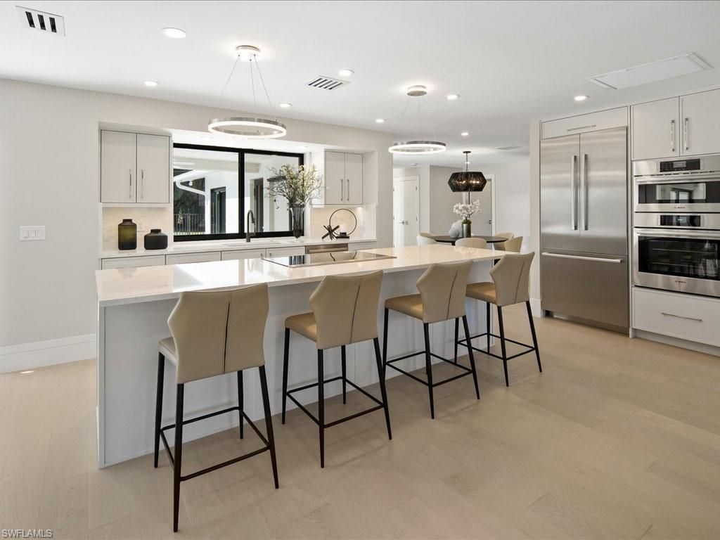 Photo of 518 Cypress WAY E, NAPLES, FL 34110 (MLS # 225029643)