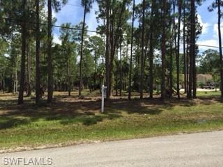 Located in the prestigious Oakes Estates neighborhood, this +-2.27 acres lot is beautifully maintained and covered with palms, oaks and pine trees. Environmental survey shows uplands. High & dry, just waiting for you to build your dream home on. Whether you-re looking for privacy, a place for your horses or your own hobby farm, this lot offers it all! Located within 10-15 minutes from our beautiful beaches, fabulous restaurants and shopping. Located in an A rated school district with easy access to I-75. Don't miss this opportunity to secure your own piece of paradise in Naples.