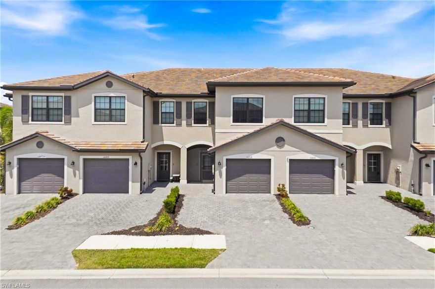 Welcome to Timber Creek living at its finest!  This beautifully maintained townhome offers a clean, modern feel with thoughtful upgrades throughout and a highly desirable lakefront view!  The screened in entry adds privacy and airflow, perfect for Florida breezes! Inside, the home features a bright, spacious layout with neutral tones and updated matte black hardware that adds a modern touch across kitchen and baths! The kitchen is also highlighted by a stylish honeycomb tile backsplash.  The living space is enhanced with custom millwork accents on the TV wall that stands out from standard builder grade townhomes.  Upstairs, the primary suite also features millwork detailing for an upscale and inviting feel with a beautiful shower glass door enclosure.  The home offers well-appointed window treatments and elevated design in ceiling fans and light fixtures throughout! Outback, enjoy picture perfect lake views that you won't find in most other townhomes versus road or preserve. At the Clubhouse, it's a vacation every day, where a lifestyle director brings the restaurant bar & grill and resort pools to life with calendarized social events and tons of fun activities! Other amenities include 2 separate gyms, saunas & locker rooms, full court indoor basketball/volleyball court, arcade, social hall, 4 pickleball courts, tennis courts, playground, putting green, event lawn, splash pad, 2 bocce courts, sand volleyball court, a firepit and more! Quick access to I75, airport, Jet Blue Park, and all the daily stops along the Daniels and Colonial Corridors!  Extended driveway, lots of guest parking, and big living without the headache of a single-family home, just add to the many reasons why it’s such a smart opportunity to own this Townhome and make yours!