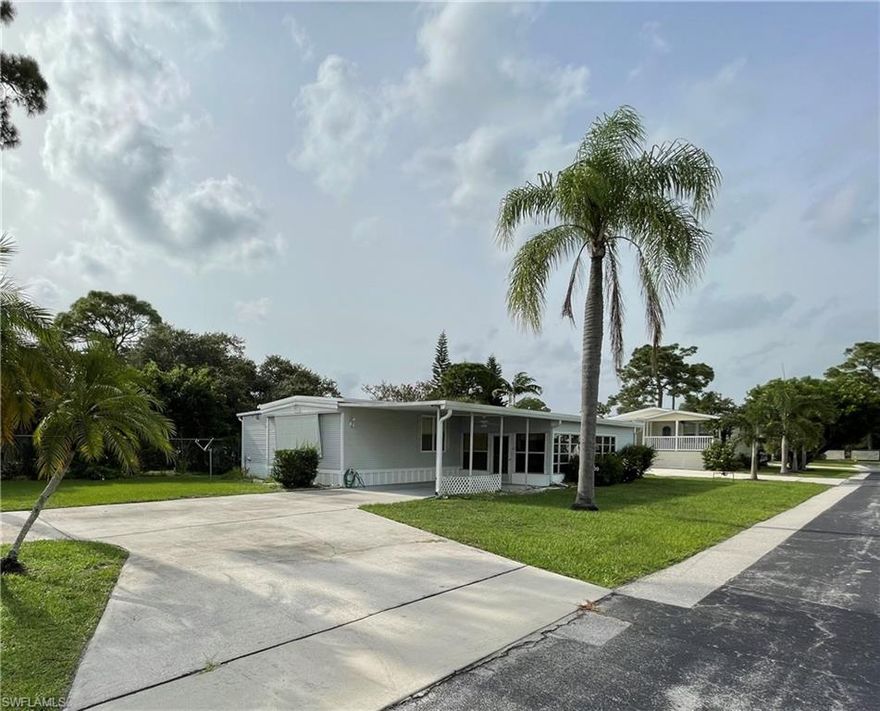 This very well kept 2 Bedroom 2 Bath manufactured home is tucked away in the one of the most desirable areas in Imperial Bonita Estates. With a split floor plan, spacious bedrooms and baths, plenty of storage and parking for three vehicles. The enclosed Florida room is huge and great for entertaining!! This 55+ Community has so much to offer from fishing, kayaking, biking and jogging paths to pickleball, swimming and tennis. This community is located in a prime location in the heart of Bonita Springs, 5 minutes to I-75 and 15 minutes min to the beach with very low HOA fees.