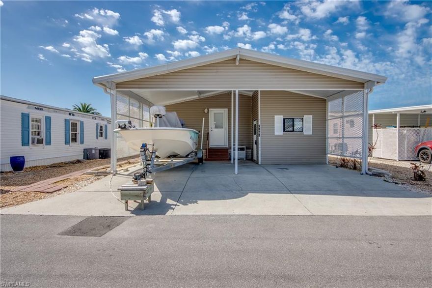 GULF ACCESS (via boat lift). This awesome 2-bedroom, 2 bath home is located in beautiful Pine Island Cove, the most sought-after 55+ community on Pine Island. This home is set at a higher elevation and didn't have any water intrusion in the home. This home has open floor plan with a large kitchen with a breakfast bar. There is a large Florida room across the back of the home and a large open deck on the canal with a covered boat lift that has access to the saltwater canal, bay and Gulf. You will be just a few minutes to some of the best fishing in SW Florida. The community has a heated saltwater pool & spa Gulf access boat ramp, fish cleaning station and a washout facility available. There is a outdoor gathering area located at the lake with covered building with picnic tables and grill. You are in easy walking distance to the pool, bocce and pickleball or you can take your golf cart all over the park for the activities. Great location on the island so it has quick access to all the activities.