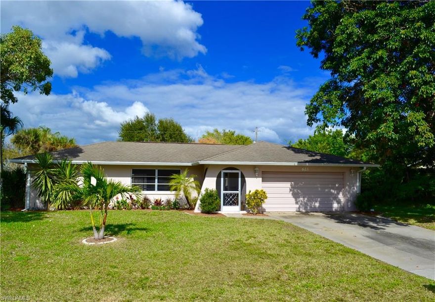 Location Location Location! AND Paid Assessments! This home is located in a quiet charming neighborhood in the most convenient location you can think of. Shopping within 5 minutes yet you still have that nice quiet neighborhood!  This 3 bedroom 2 bath 2 car garage home has an extended large screened lanai with a pool bath for all your outside living. The interior is spacious and clean with a split floor plan. Its bright and light with 2 sets of sliders and a serving window in the kitchen to the lanai. This home has a lot to offer and it truly is the perfect family home!  You won't be disappointed with this home!! Come see it today!!