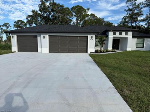 Photo of 616 Plumosa AVE, LEHIGH ACRES, FL 33972 (MLS # 225078517)