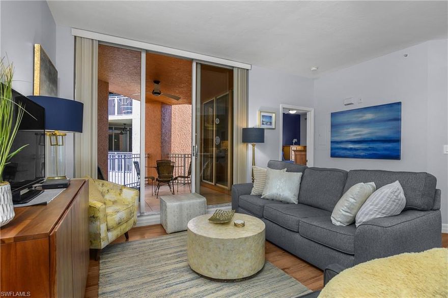 Live and Vacation in downtown Naples Florida!  Walk to the Bay watching boats come and go, or rent a boat, walk to shops and restaurants, bike to the beach.  Beautifully updated with wood style flooring, updated kitchen cabinetry, new air-conditioning, all waiting for you in popular Bayfront. Use it part-time for yourself and family, and as an income producing property when you are not there. Laundry is located inside the unit.  It's tropical living at its best.  Enjoy the Bayfront lifestyle with on-site dining, shopping, and recreational activities. Check out the new rooftop bar next door, take a leisurely stroll to world famous Fifth Avenue. The building boasts fantastic amenities including a secure parking garage, two sparkling pools, BBQ areas, a community center, tennis court, and two pickleball courts. This condo has it all—luxury, comfort, and a world class location.